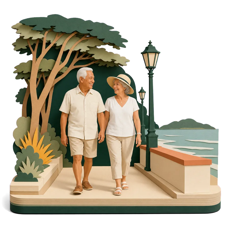 A retired couple walk along a flat seafront promenade with lamp posts and shady trees, for where Australians live in Dumaguete
