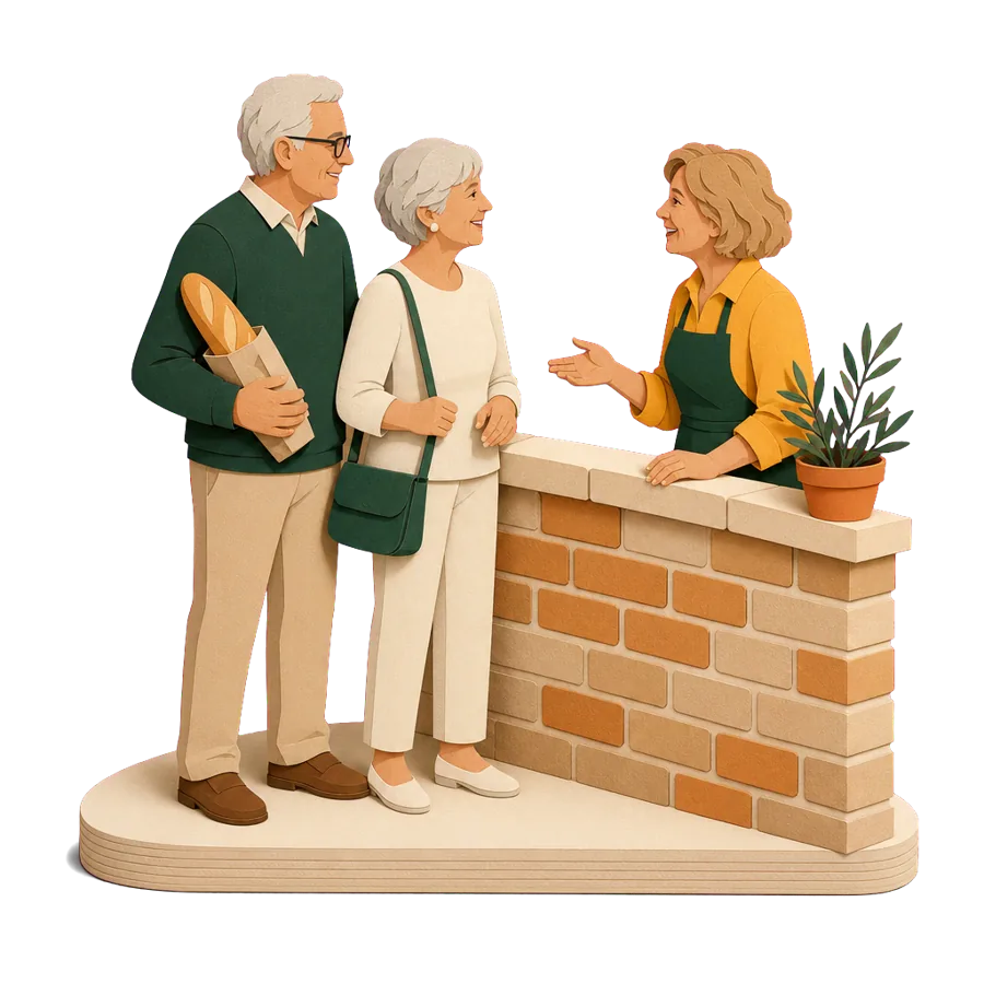 A couple chat with a French neighbour over a low brick wall, for the local help that made the move possible