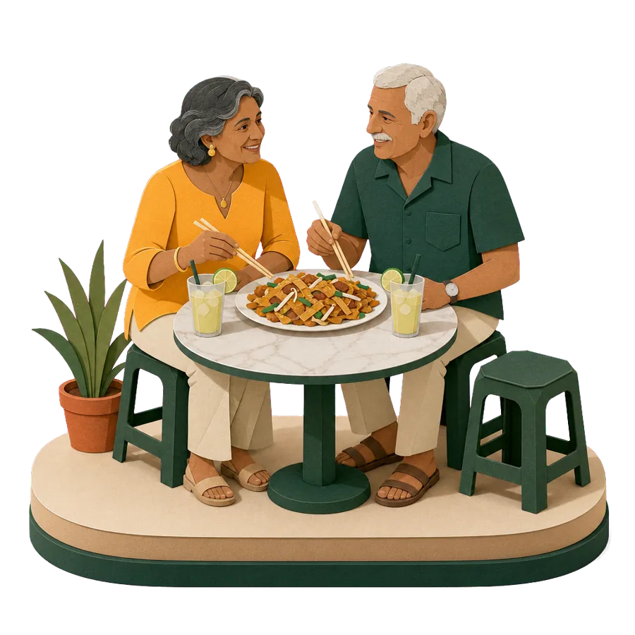 A retired couple share char kway teow and iced lime juice at a hawker table, for everyday costs in Penang